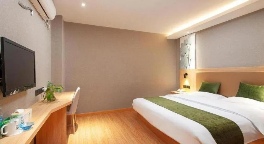Bed in GreenTree Inn Shanghai Jiading Anting Motor City Express Hotel
