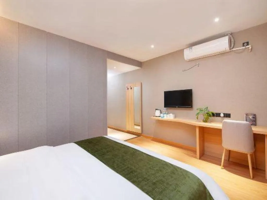 Bed in GreenTree Inn Shanghai Jiading Anting Motor City Express Hotel
