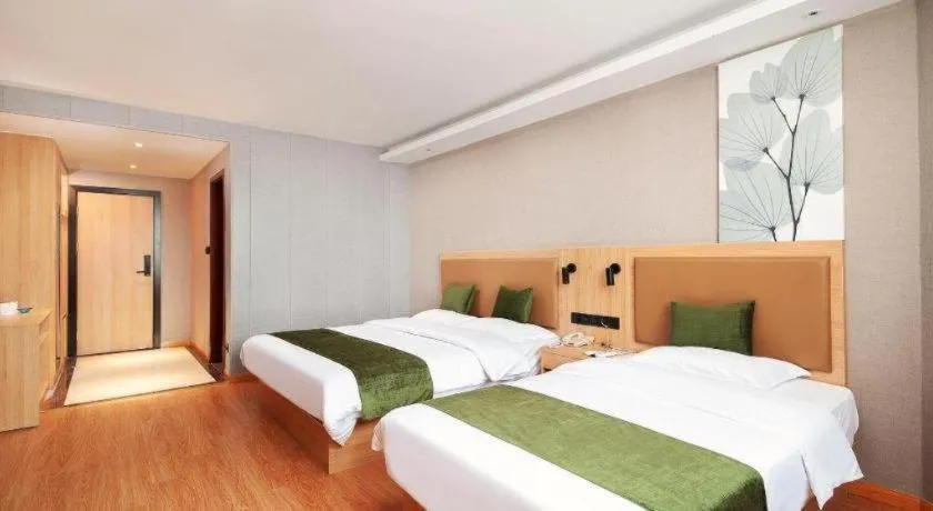 Bed in GreenTree Inn Shanghai Jiading Anting Motor City Express Hotel