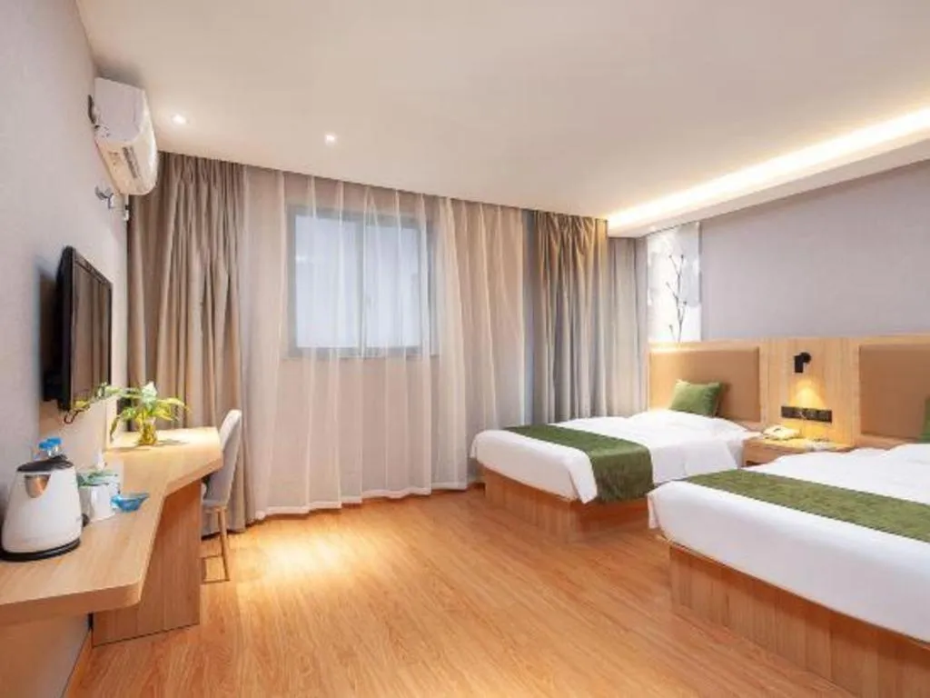 Bed in GreenTree Inn Shanghai Jiading Anting Motor City Express Hotel