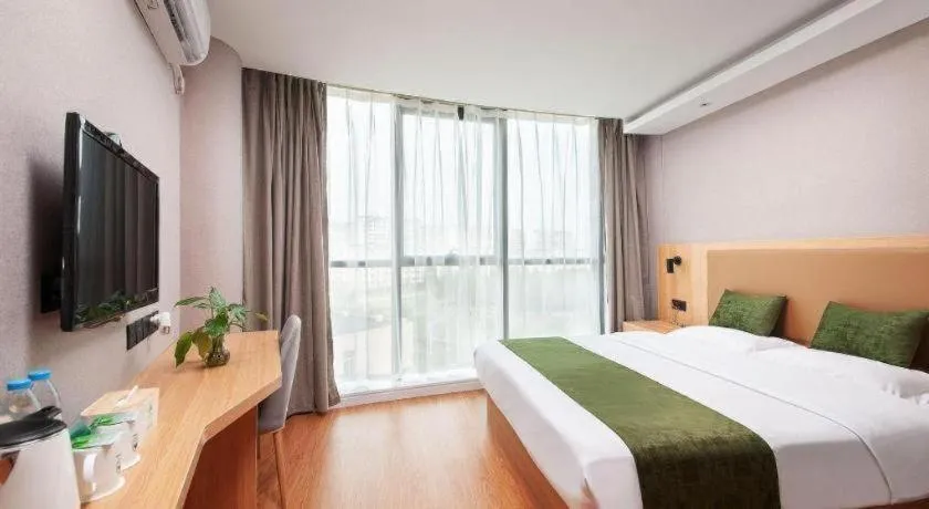 Bed in GreenTree Inn Shanghai Jiading Anting Motor City Express Hotel