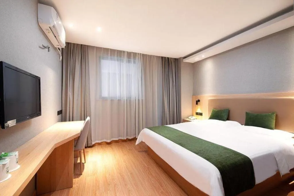 Bed in GreenTree Inn Shanghai Jiading Anting Motor City Express Hotel
