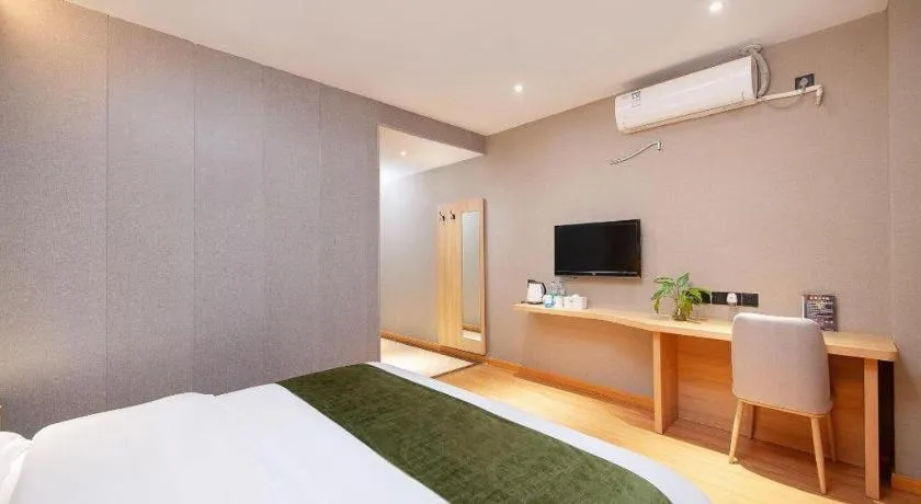 Bed in GreenTree Inn Shanghai Jiading Anting Motor City Express Hotel