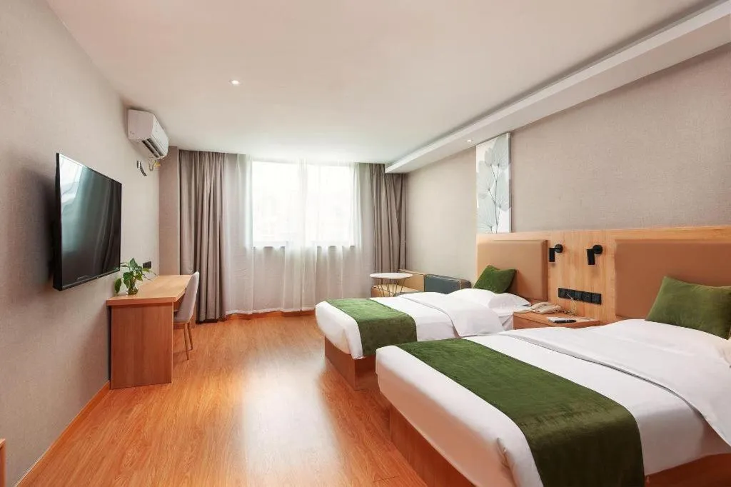 Bed in GreenTree Inn Shanghai Jiading Anting Motor City Express Hotel