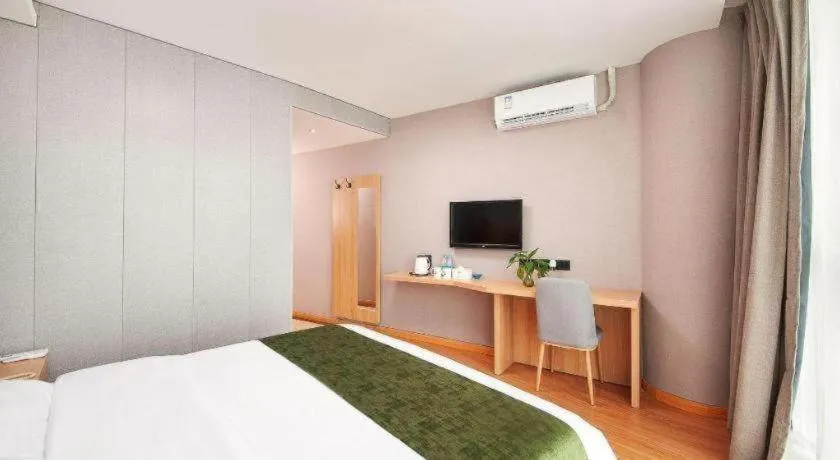 Bed in GreenTree Inn Shanghai Jiading Anting Motor City Express Hotel