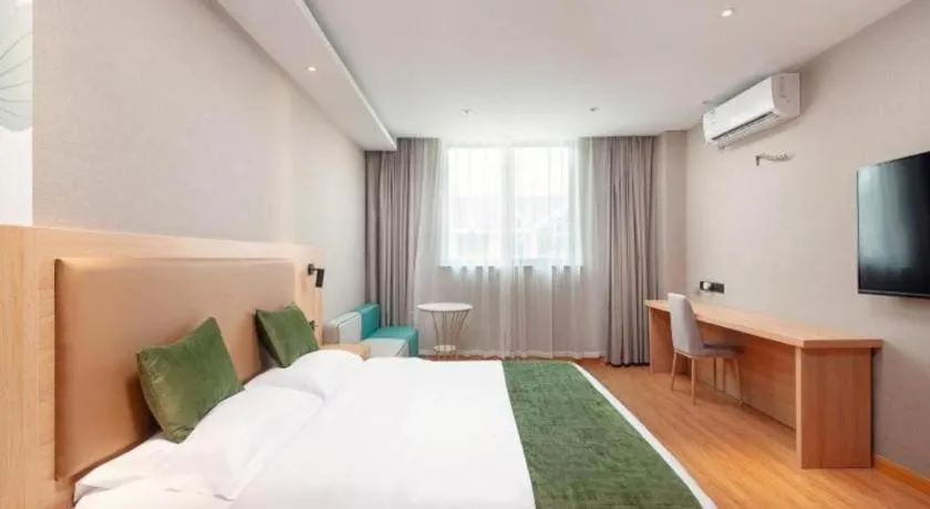 Bed in GreenTree Inn Shanghai Jiading Anting Motor City Express Hotel