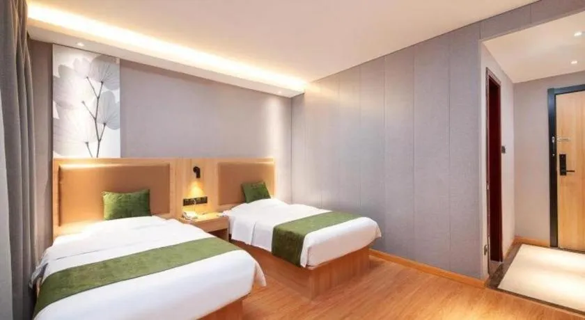 Bed in GreenTree Inn Shanghai Jiading Anting Motor City Express Hotel