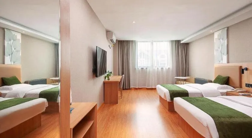 Bed in GreenTree Inn Shanghai Jiading Anting Motor City Express Hotel