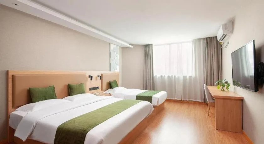 Bed in GreenTree Inn Shanghai Jiading Anting Motor City Express Hotel