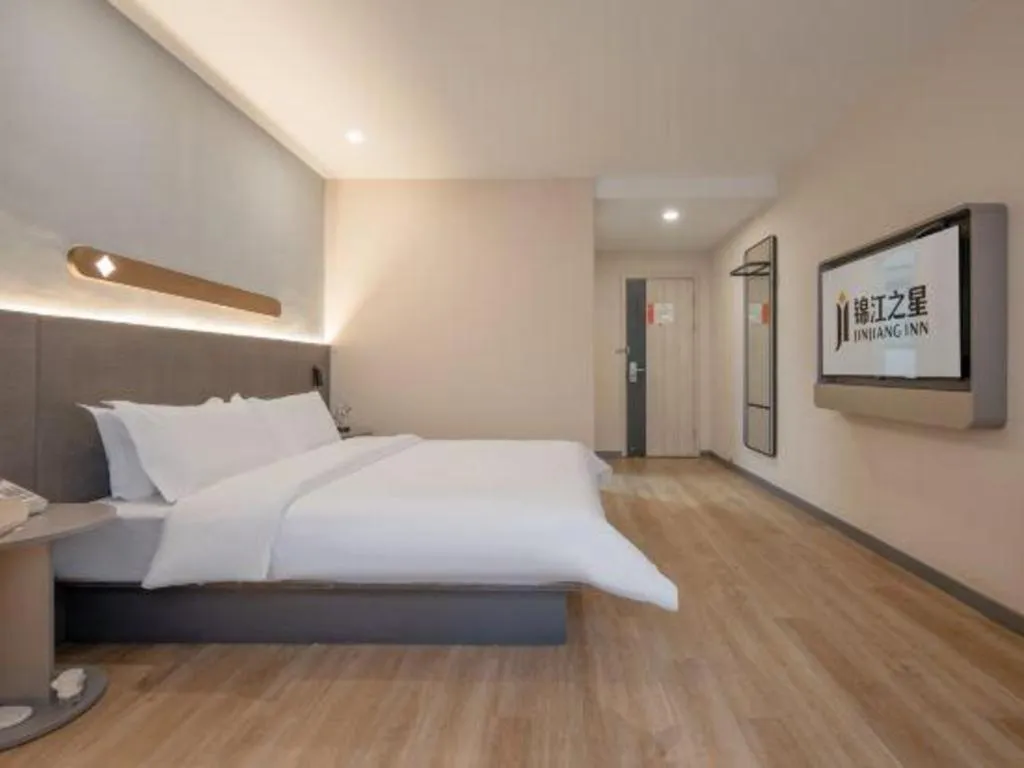 Bed in Jinjiang Inn Hangzhou Lin'an Qianwang Street