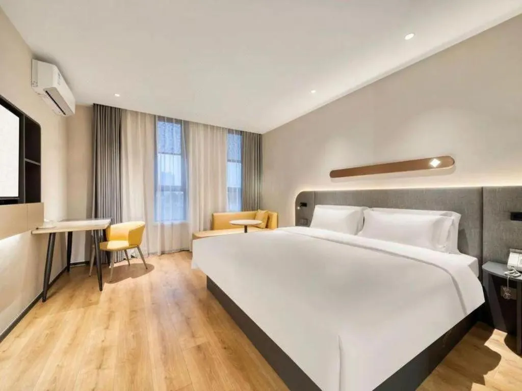 Bed in Jinjiang Inn Hangzhou Lin'an Qianwang Street