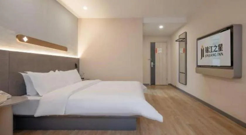 Bed in Jinjiang Inn Hangzhou Lin'an Qianwang Street