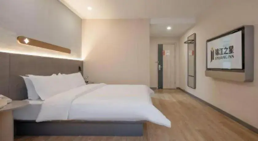 Bed in Jinjiang Inn Hangzhou Lin'an Qianwang Street Bed in Jinjiang Inn Hangzhou Lin'an Qianwang Street