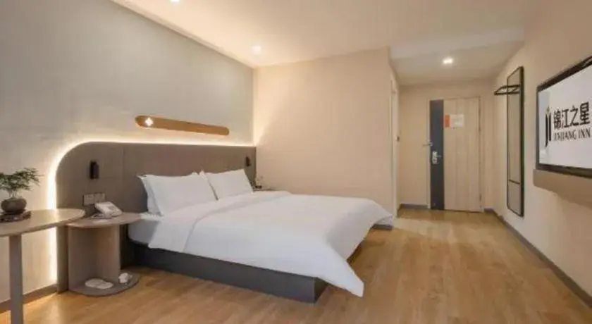 Bed in Jinjiang Inn Hangzhou Lin'an Qianwang Street Bed in Jinjiang Inn Hangzhou Lin'an Qianwang Street