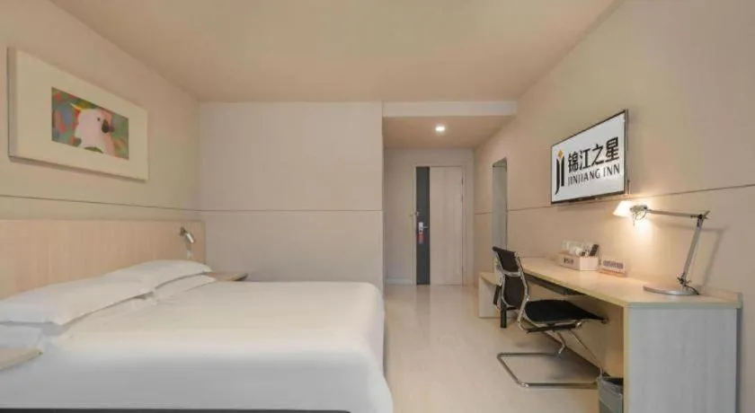 Bed in Jinjiang Inn Hangzhou Lin'an Qianwang Street