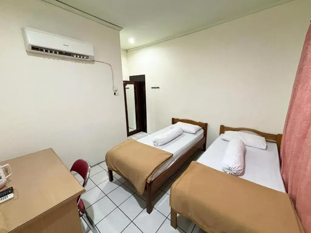 Bed in Sumber Ria Hotel Bed in Sumber Ria Hotel