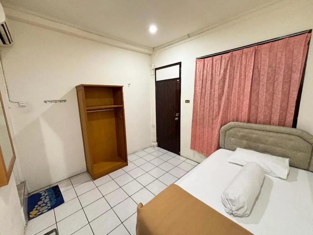 Bed in Sumber Ria Hotel