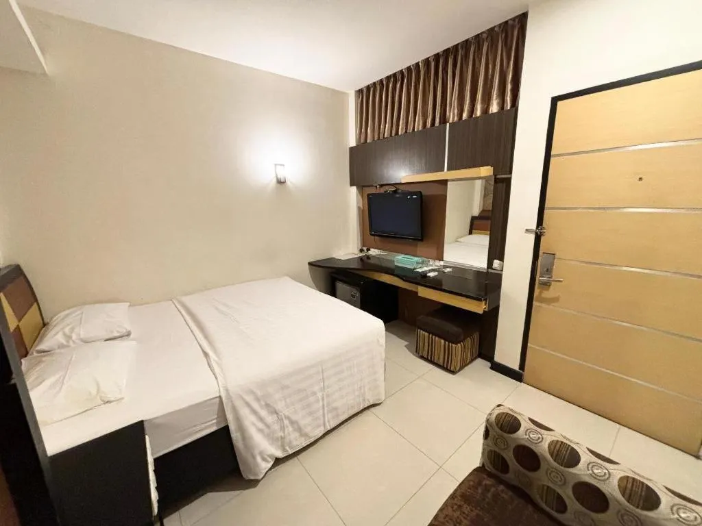 Bed in Sumber Ria Hotel