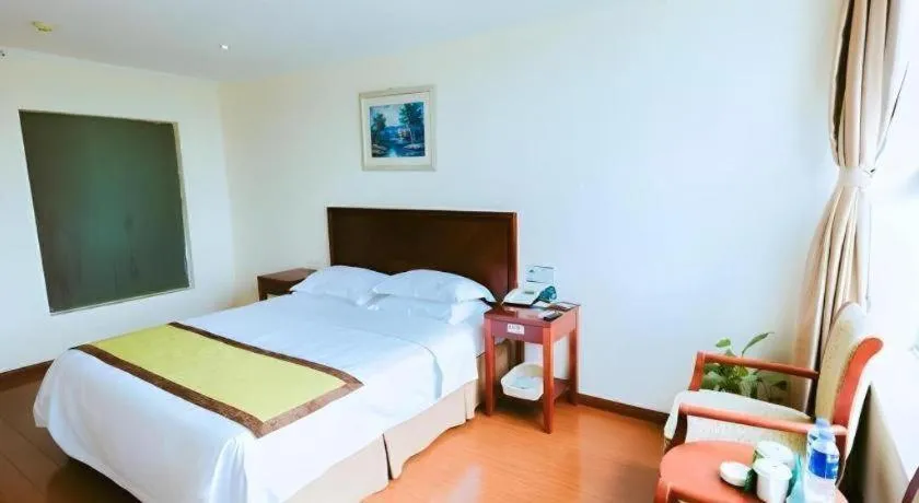 Bed in GreenTree Inn Jiaxing Zhongan Business Hotel