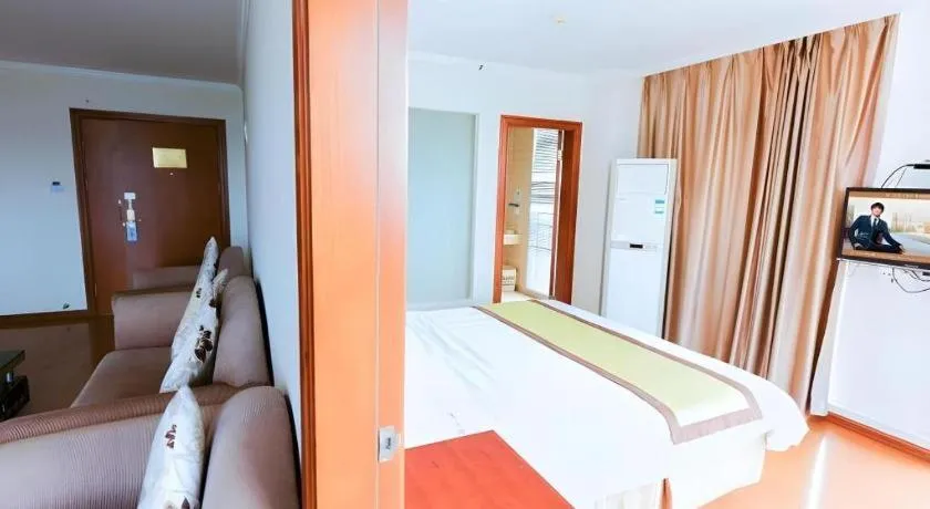 Bed in GreenTree Inn Jiaxing Zhongan Business Hotel