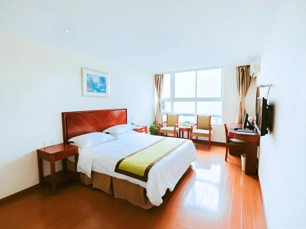 Bed in GreenTree Inn Jiaxing Zhongan Business Hotel