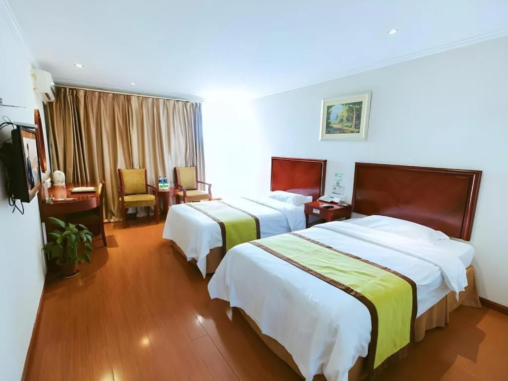 Bed in GreenTree Inn Jiaxing Zhongan Business Hotel