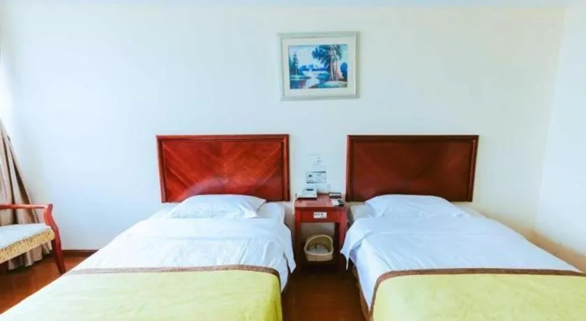 Bed in GreenTree Inn Jiaxing Zhongan Business Hotel