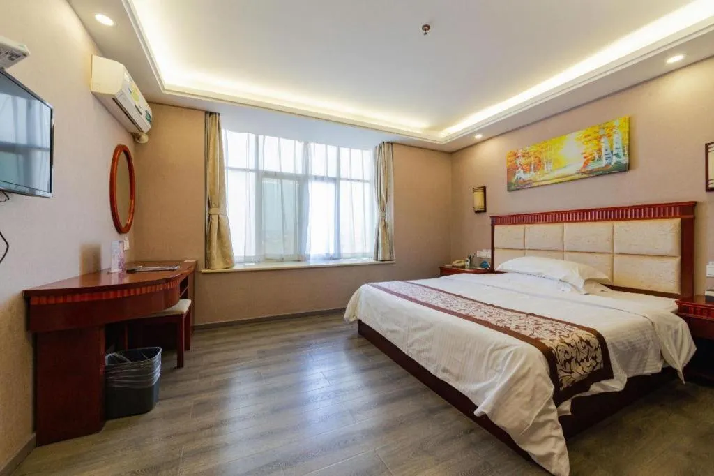 Bed in GreenTree Inn Guangdong Huizhou Chenjiang Intercity Rail Station Business Hotel