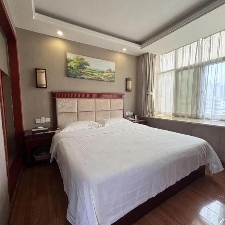 Bed in GreenTree Inn Guangdong Huizhou Chenjiang Intercity Rail Station Business Hotel