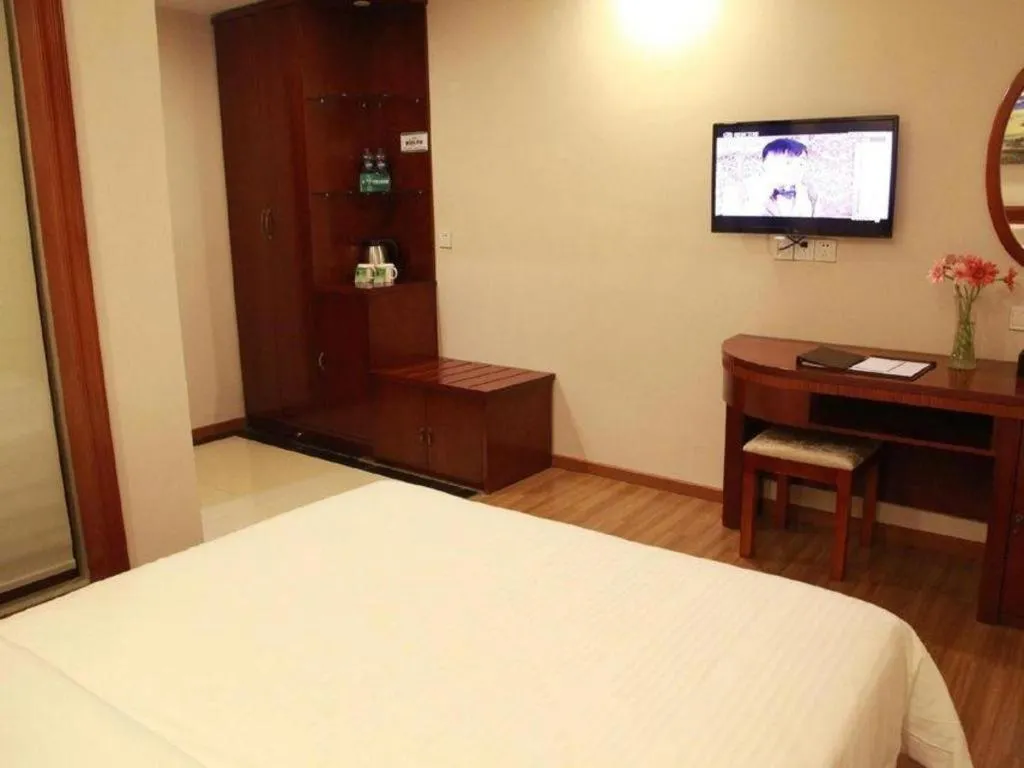 Bed in GreenTree Inn Guangdong Huizhou Chenjiang Intercity Rail Station Business Hotel