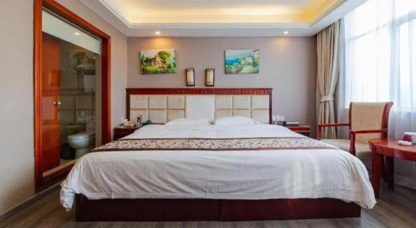 Bed in GreenTree Inn Guangdong Huizhou Chenjiang Intercity Rail Station Business Hotel