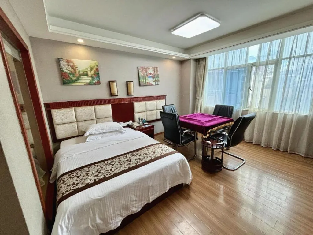 Bed in GreenTree Inn Guangdong Huizhou Chenjiang Intercity Rail Station Business Hotel