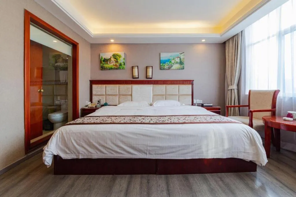 Bed in GreenTree Inn Guangdong Huizhou Chenjiang Intercity Rail Station Business Hotel