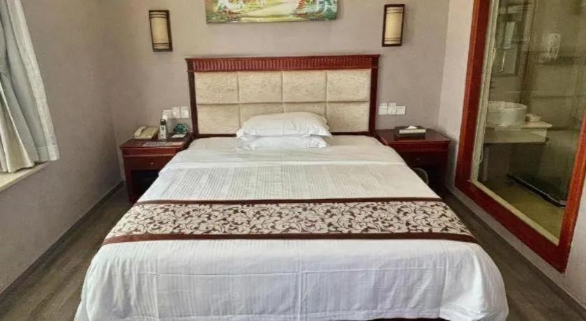 Bed in GreenTree Inn Guangdong Huizhou Chenjiang Intercity Rail Station Business Hotel