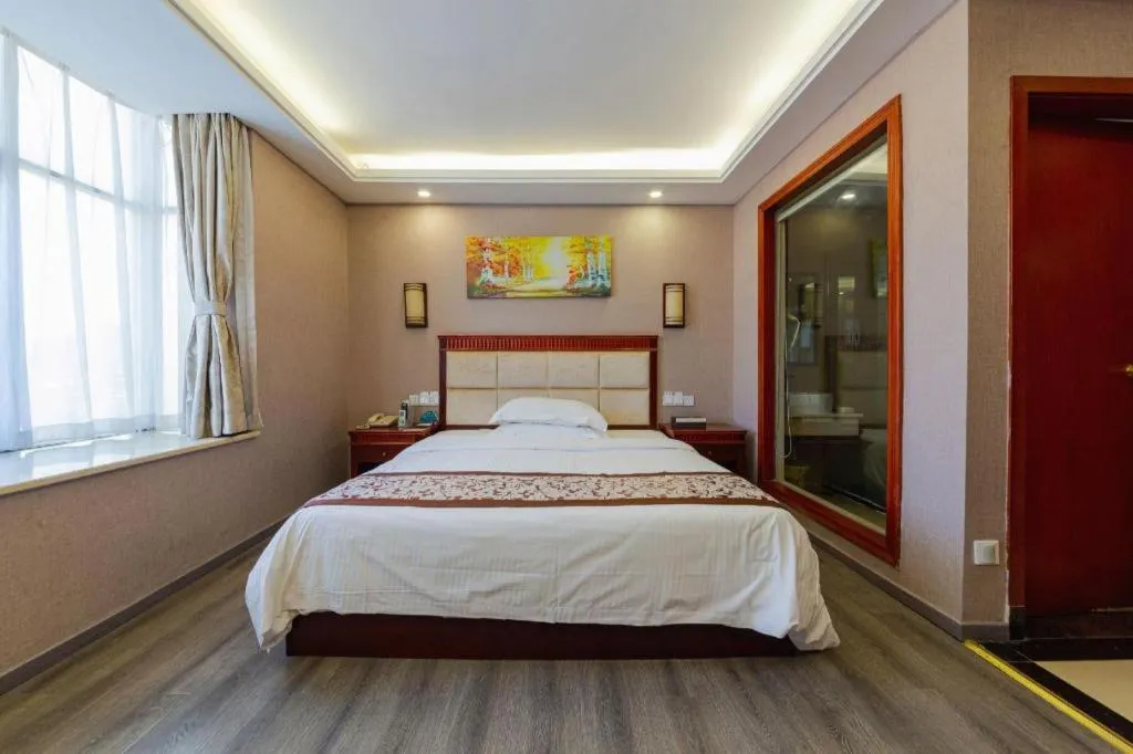 Bed in GreenTree Inn Guangdong Huizhou Chenjiang Intercity Rail Station Business Hotel