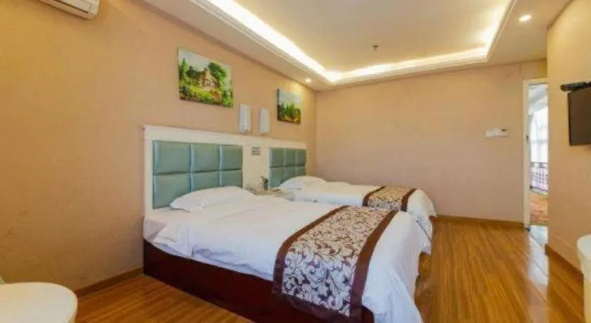 Bed in GreenTree Inn Guangdong Huizhou Chenjiang Intercity Rail Station Business Hotel