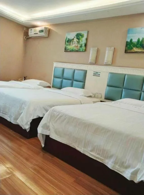 Bed in GreenTree Inn Guangdong Huizhou Chenjiang Intercity Rail Station Business Hotel