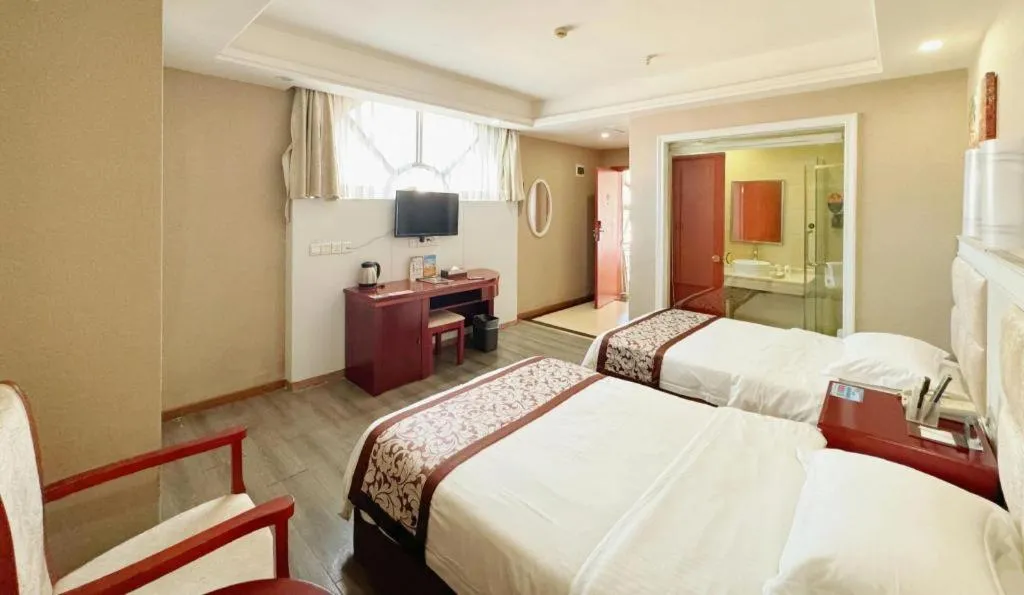 Bed in GreenTree Inn Guangdong Huizhou Chenjiang Intercity Rail Station Business Hotel