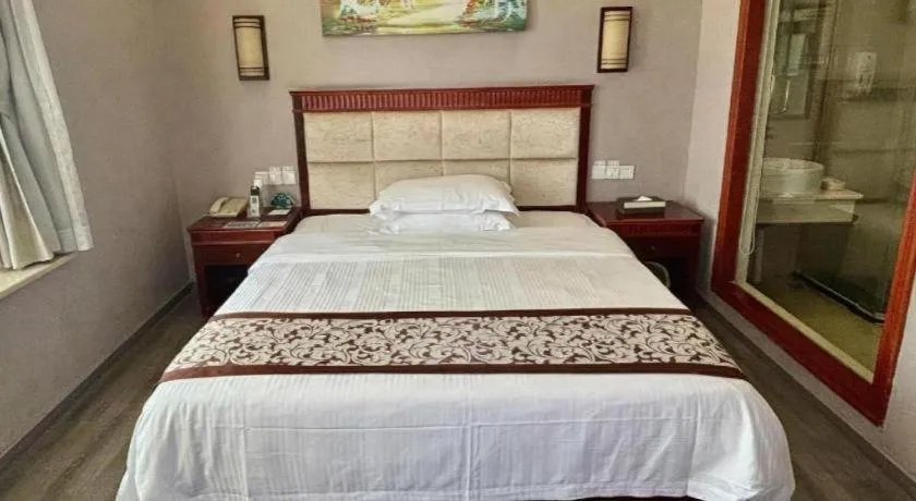Bed in GreenTree Inn Guangdong Huizhou Chenjiang Intercity Rail Station Business Hotel
