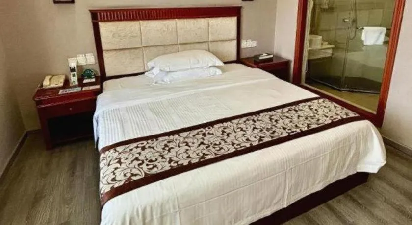 Bed in GreenTree Inn Guangdong Huizhou Chenjiang Intercity Rail Station Business Hotel