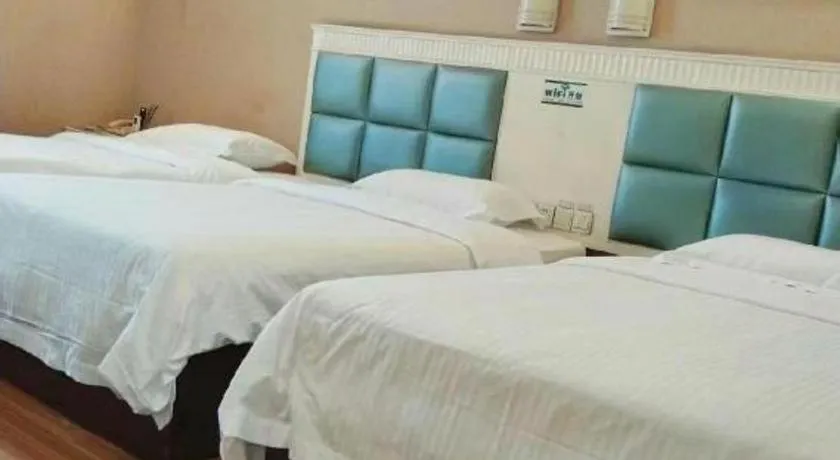 Bed in GreenTree Inn Guangdong Huizhou Chenjiang Intercity Rail Station Business Hotel