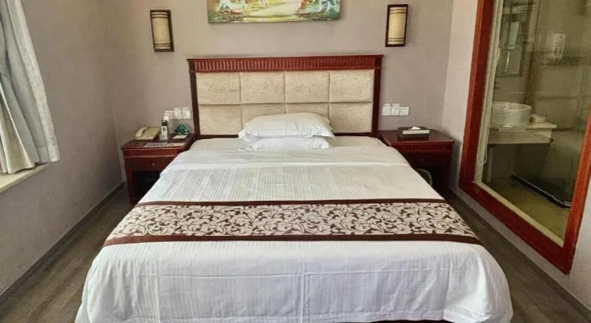 Bed in GreenTree Inn Guangdong Huizhou Chenjiang Intercity Rail Station Business Hotel