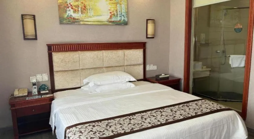 Bed in GreenTree Inn Guangdong Huizhou Chenjiang Intercity Rail Station Business Hotel