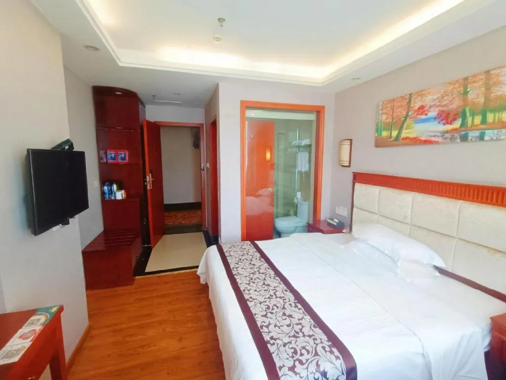 Bed in GreenTree Inn Guangdong Huizhou Chenjiang Intercity Rail Station Business Hotel
