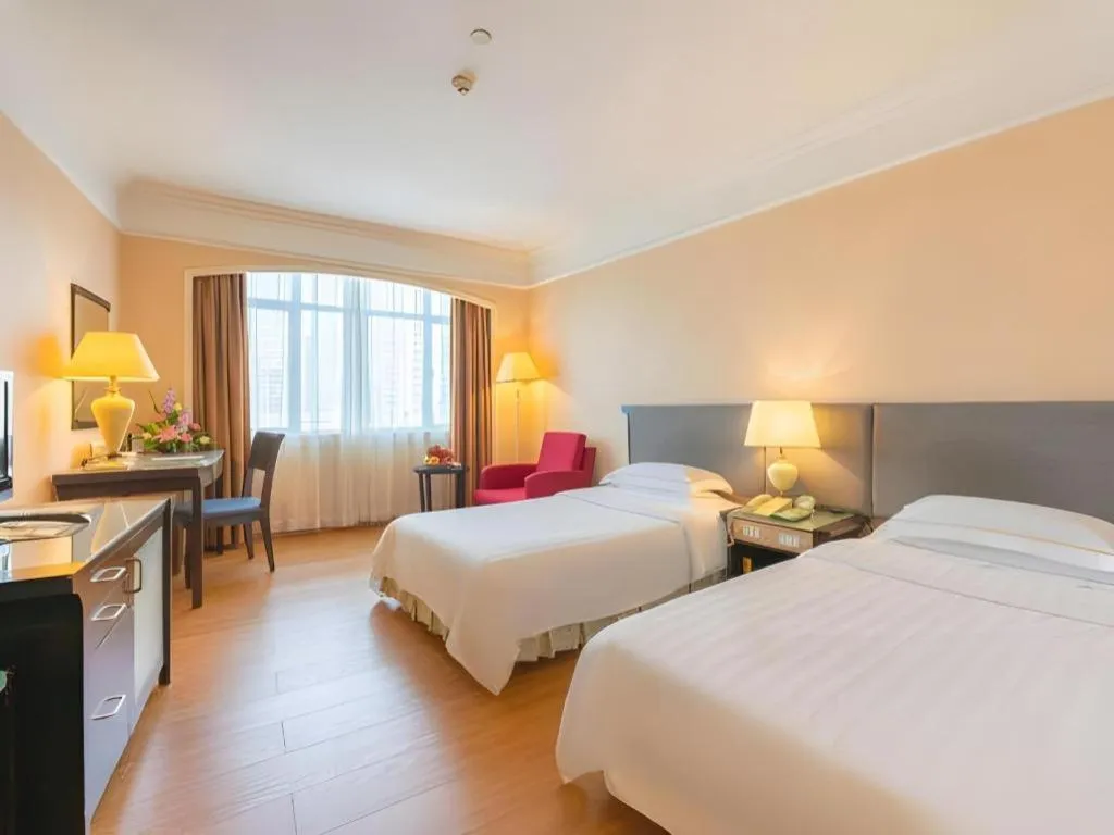 Bed in Shantou Golden Gulf Hotel