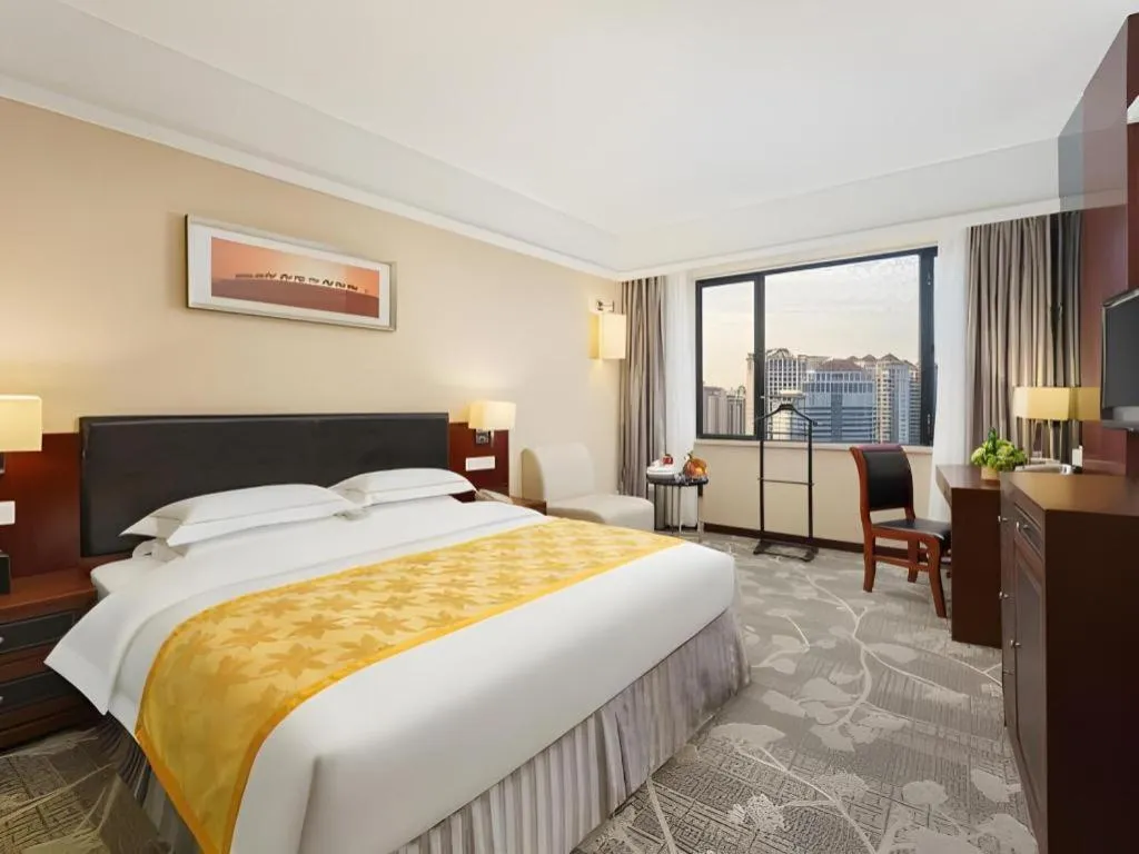 Bed in Shantou Golden Gulf Hotel