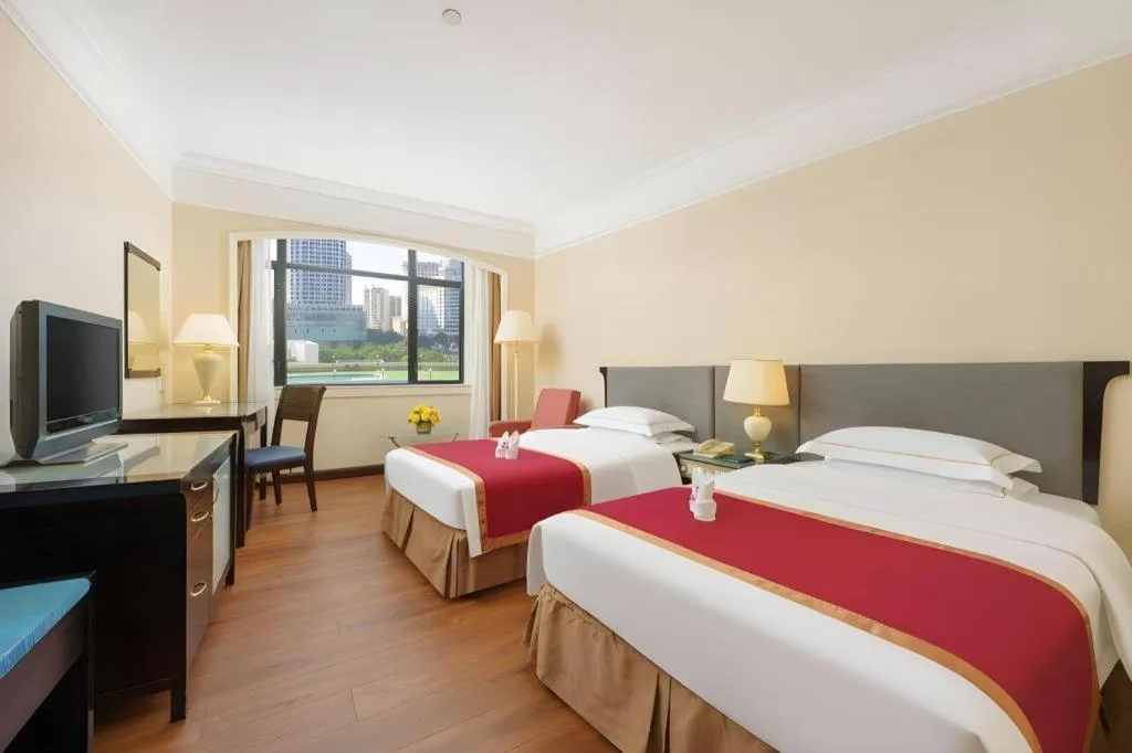 Bed in Shantou Golden Gulf Hotel