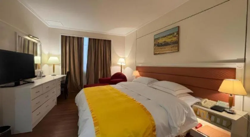 Bed in Shantou Golden Gulf Hotel