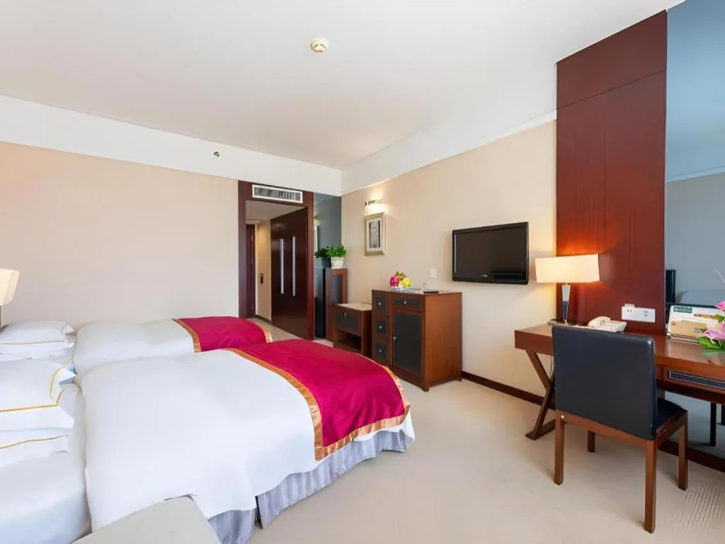 Bed in Shantou Golden Gulf Hotel