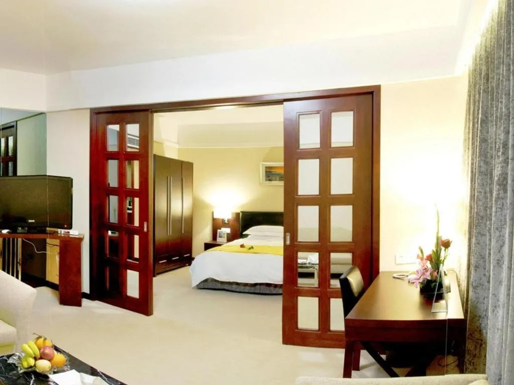 Bed in Shantou Golden Gulf Hotel